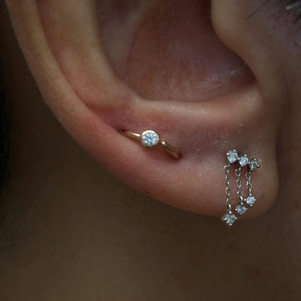 Tragus and flat piercing curation at Piercing Lab Calgary